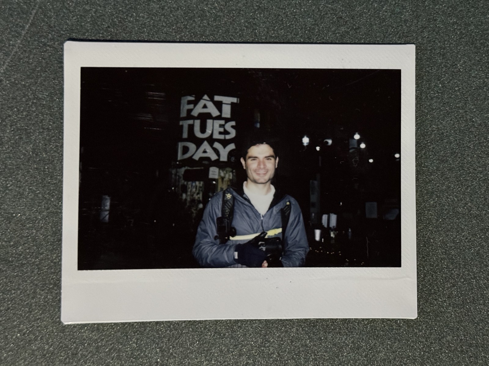 Instant photo of South Street Sam taken by a fan on South Street, resting on a table