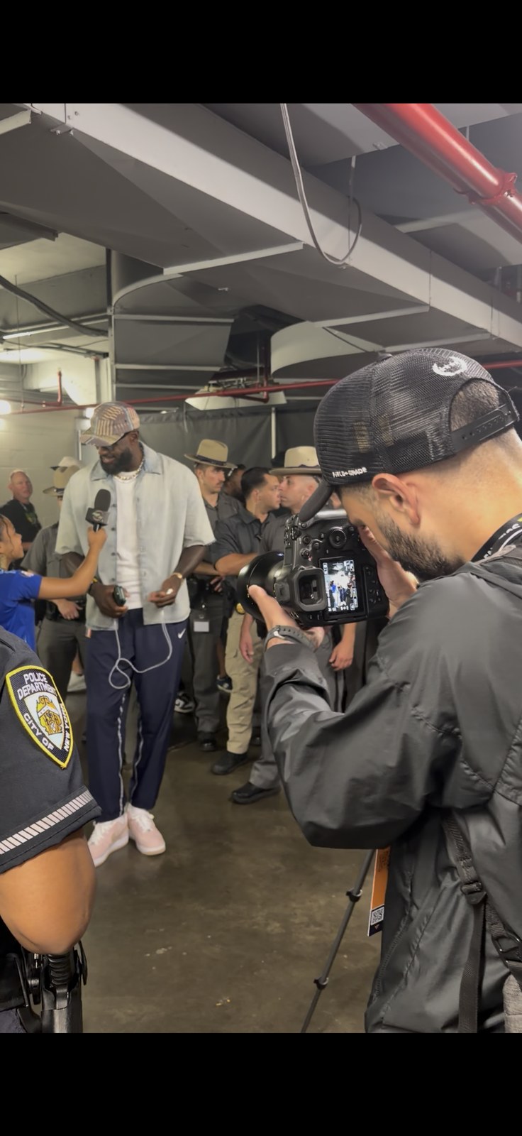 South Street Sam (Sami Aziz) photographing LeBron James